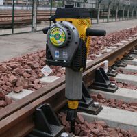 Internal combustion impact tamping pick