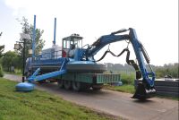 Waterking type multi-function dredger with replaceable tools